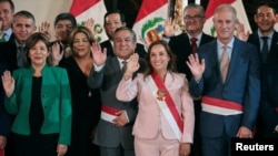 President of Peru Dina Boluarte poses with her newly appointed state ministers after a swearing in ceremony in Lima, Peru April 1, 2024.