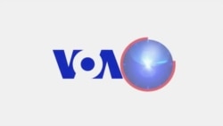 VOA60 America- December 24, 2014