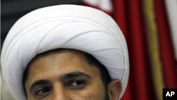 Bahrain's main Shi'ite Wefaq opposition group leader Sheikh Ali Salman speaks to journalists during a news conference in Manama, March 30, 2011
