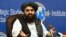 Afghanistan's acting Foreign Minister Amir Khan Muttaqi gestures while speaking during an event held in the Institute of Strategic Studies in Islamabad on Nov.12, 2021. 