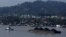 Sebuah kapal menarik tongkang batubara di sepanjang Sungai Mahakam, Samarinda, Kalimantan Timur (foto: Reuters).