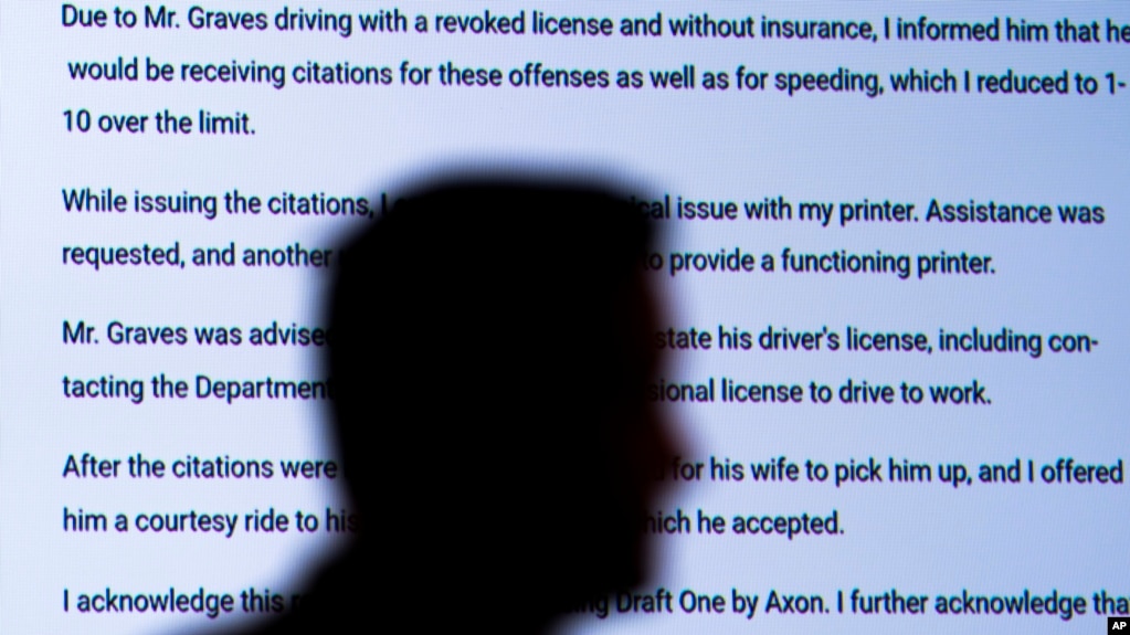 Captain Jason Bussert demonstrates Draft One, an AI powered software that creates police reports from body cam audio, at Oklahoma City police headquarters on Friday, May 31, 2024 in Oklahoma City, Oklahoma. (AP Photo/Nick Oxford)