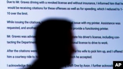 Captain Jason Bussert demonstrates Draft One, an AI powered software that creates police reports from body cam audio, at Oklahoma City police headquarters on Friday, May 31, 2024 in Oklahoma City, Oklahoma. (AP Photo/Nick Oxford)