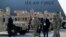 Петро Порошенко проходить повз перших десяти американських «Хамві» для української армії. Бориспіль, Київ, Україна, 25 березня 2015.