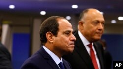 FILE - Egypt's President Abdel Fattah el-Sissi arrives for the 70th session of the United Nations General Assembly at U.N. headquarters. Egypt's president has vowed that those responsible for stripping an elderly Christian woman and parading her naked on the streets will be brought to justice. 