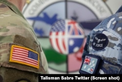 Upacara pembukaan latihan militer gabungan AS-Australia "Saber Saber-2021" di pangkalan angkatan udara Australia, 14 Juli 2021. (Twitter/ Latihan Militer Gabungan Pengawal Sabre AS-Australia)