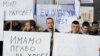 FILE - People protest after Kosovo's decision to raise tariffs on Serbian and Bosnian goods, in the village of Rudare near Mitrovica, Kosovo, Nov. 23, 2018.