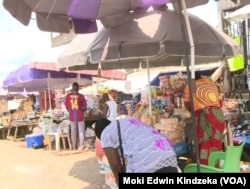 People buy and sell their goods in Ekok, a Cameroonian village on the southwestern border with Nigeria.