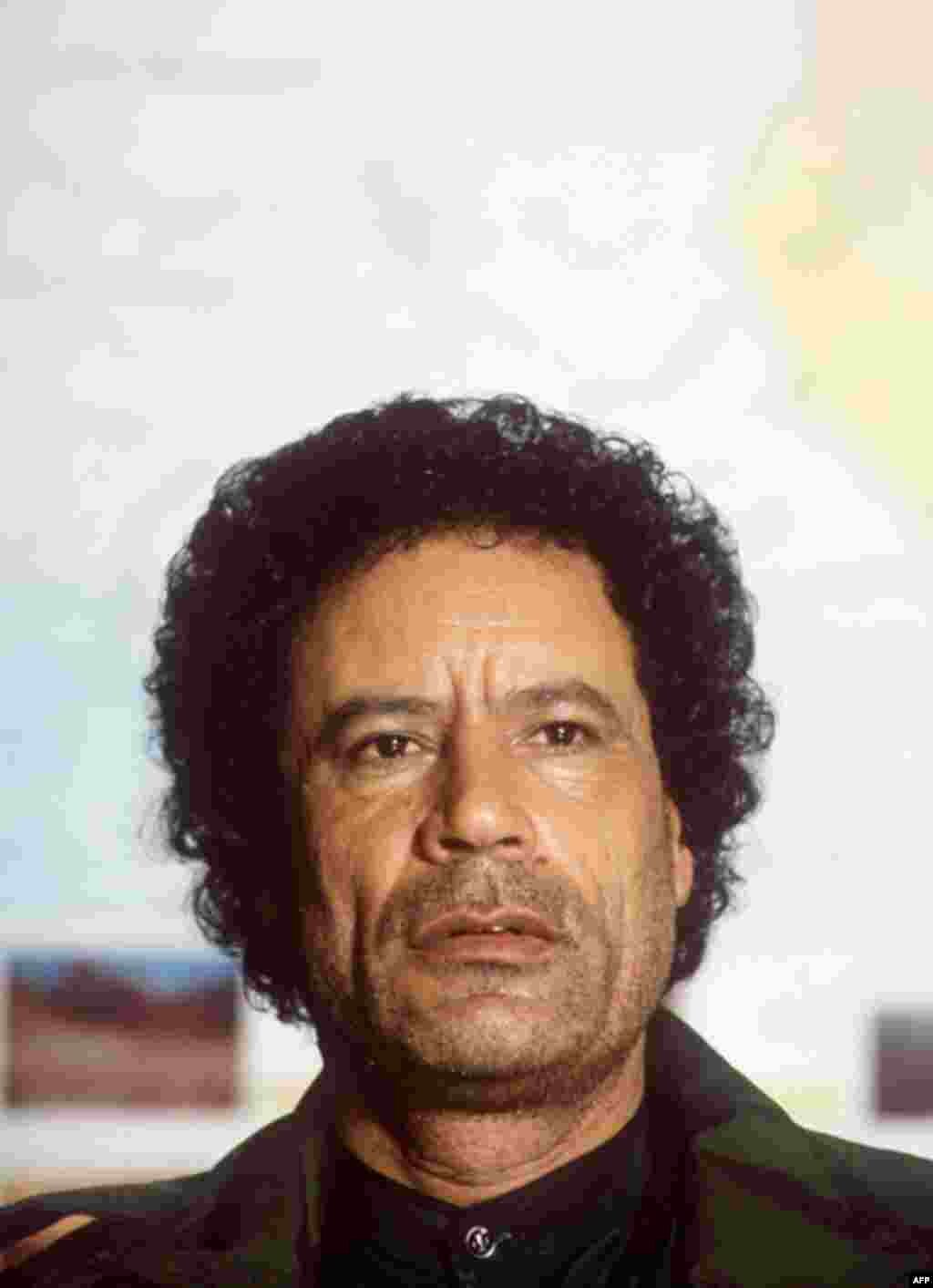 Libyan Head of State Colonel Moammar Gadhafi, appears tired and unshaven as he addresses journalists 02 February 1986 in Tripoli during a meeting of "The High Command of The Revolutionary Forces of The Arab Nation", (AFP).