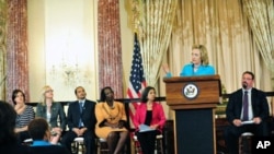 Secretary Clinton speaks at the annual Trafficking in Persons award ceremony held in the Ben Franklin room at the State Department.