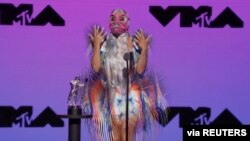 Lady Gaga accepts the award for Best Collaboration for "Rain On Me" during the 2020 MTV VMAs in this screen grab image made available on August 30, 2020. VIACOM/Handout via REUTERS ATTENTION EDITORS - THIS IMAGE HAS BEEN SUPPLIED BY A THIRD PARTY…
