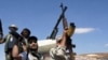 Libya's Provisional Fighters Expand Control of Former Gadhafi Stronghold