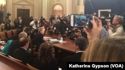 Democratic presidential candidate, former Secretary of State Hillary Clinton takes her seat before testifying before the House Benghazi Committee on Capitol Hill, in Washington, D.C., Oct. 22, 2015 