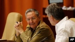 FILE - Cuba's President Raul Castro, left, and Vice President Miguel Diaz-Canel.