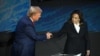 FILE - U.S. Vice President Kamala Harris shakes hands with former U.S. President Donald Trump during a presidential campaign debate in Philadelphia, Pennsylvania, on Sept. 10, 2024. After the debate, Cuban state-run newspaper Granma reported that the two traded "low blows."