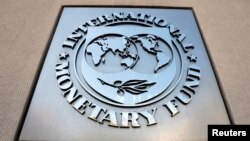 FILE: International Monetary Fund logo is seen outside the headquarters building during the IMF/World Bank spring meeting in Washington, U.S., April 20, 2018.