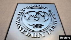 FILE: International Monetary Fund logo is seen outside the headquarters building. Taken 4.20.2018