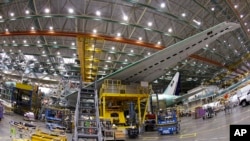 FILE - A Boeing 777 plane on the assembly line in Everett, Washington.