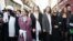 FILE — French actresses Isabelle Adjani (L), Julie Gayet (C) singer and songwriter Yael Naim (2ndL) and French Culture Minister Rima Abdul-Malak (3rdR) take part in a “silent march” with celebrities and artists for peace in the Middle East in Paris on November 19, 2023.