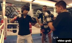 Sadiq, a 16-year-old migrant from Afghanistan, would one day like to be Austria's new Thai-style boxing champion.