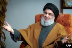 FILE - A photo released by the office of Iranian Supreme Leader Ayatollah Ali Khamenei on Sept. 28, 2019, shows Hezbollah leader Hassan Nasrallah during what was called an 