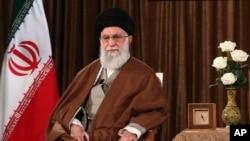 Iranian supreme leader, Supreme Leader Ayatollah Ali Khamenei sits prior to address the nation on state television, in Tehran, Iran, March 22, 2020.