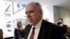 John Brennan, nominee for CIA Director, arrives at a meeting with Senate Intelligence Committee Chairwoman Dianne Feinstein on Capitol Hill, January 31, 2013.