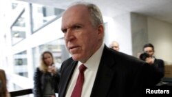 John Brennan, nominee for CIA Director, arrives at a meeting with Senate Intelligence Committee Chairwoman Dianne Feinstein on Capitol Hill January 31, 2013.