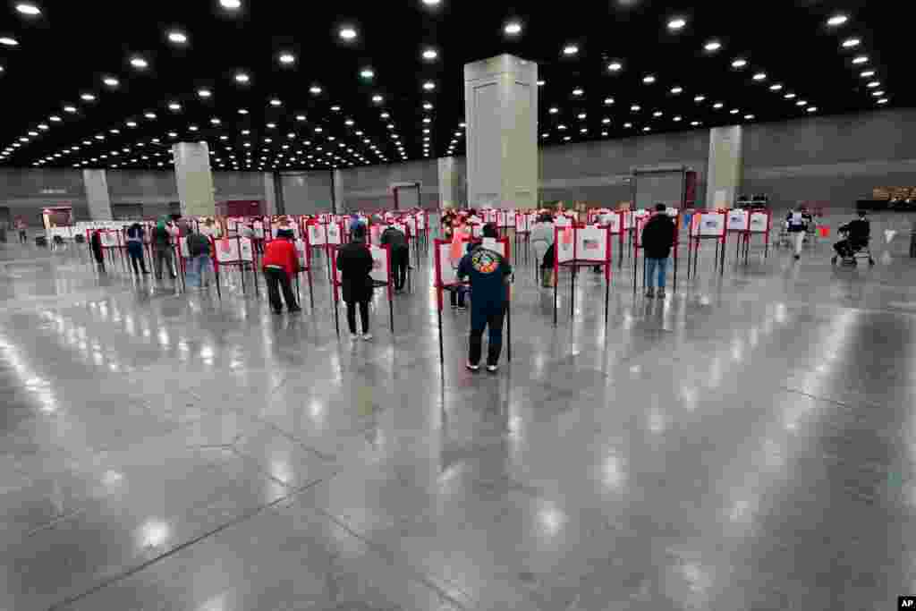 Voters cast their ballots at the Kentucky Exposition Center in Louisville, Kentucky.