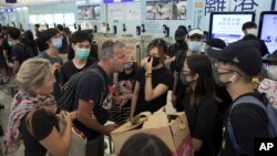 VOA Asia – China considers how to quell Hong Kong protests