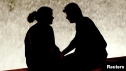 A couple in Athens' Syntagma Square