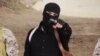 FILE - An Islamic State militant holdsa gun in this still image from an undated video made available on a social media website on April 19, 2015. 