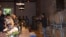 Visitors learn about wine at the tasting room of Sula Vineyards in Nashik, Maharashtra, India. (Anjana Pasricha for VOA)