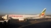 FILE - Workers service an Ethiopian Airlines Boeing 737-800 plane at the Bole International Airport in Ethiopia's capital Addis Ababa, Jan. 26, 2017.