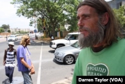 Homeless man Donovan Hermans at an intersection in Johannesburg that’s notorious for road crashes.