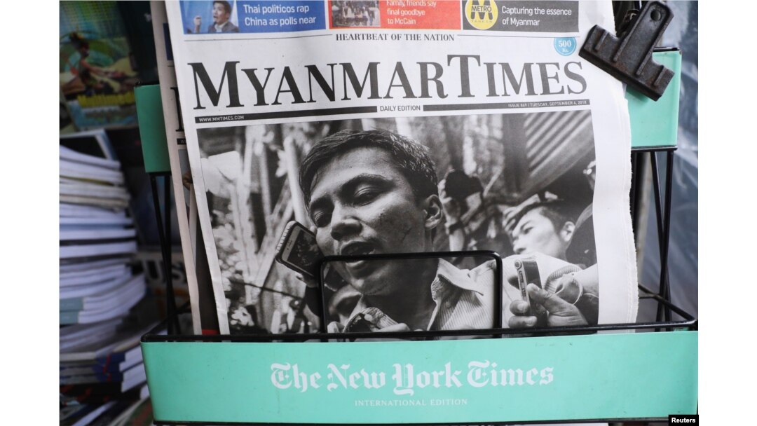 A Myanmar newspaper displays the story about the sentences received by Reuters journalists Wa Lone and Kyaw Soe Oo, on its front page in Yangon, Myanmar, Sept. 4, 2018.