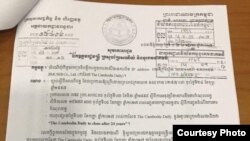 A photograph showing a letter from the General Department of Taxation asking the Ministry of Posts and Telecommunications to ask all internet service providers to block The Cambodia Daily's website and social media accounts. (Courtesy image)