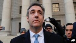 Michael Cohen walks out of federal court Nov. 29, 2018, in New York, after pleading guilty to lying to Congress about work he did on an aborted project to build a Trump Tower in Russia. Cohen said he lied to be consistent with President Trump's "political message."