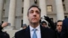 Michael Cohen walks out of federal court Nov. 29, 2018, in New York, after pleading guilty to lying to Congress about work he did on an aborted project to build a Trump Tower in Russia. Cohen said he lied to be consistent with President Trump's "political