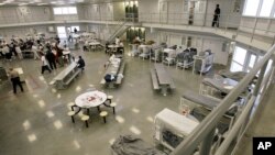FILE - The "B" cell and bunk unit of the Northwest Detention Center in Tacoma, Washington. is shown, Oct. 17, 2008.