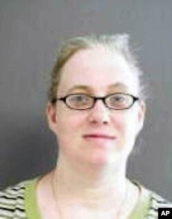 This undated photo provided by the Texas Department of Public Safety via the Houston Chronicle shows Julia Poff, a woman accused of mailing potentially deadly homemade bombs to then-President Barack Obama and Texas Gov. Greg Abbott in 2016. Poff was arres