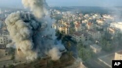 This image posted online by the Ahrar al-Sham militant group purports to show a blast in a neighborhood of Aleppo, Syria. Syrian government forces launched a counteroffensive Oct. 29, 2016, under the cover of airstrikes to regain control of the city.