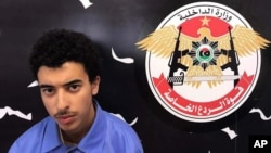 Hashim Ramadan Abedi appears inside the Tripoli-based Special Deterrent anti-terrorism force unit after his arrest on Tuesday for alleged links to the Islamic State extremist group, May 24, 2017.
