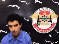 Hashim Ramadan Abedi appears inside the Tripoli-based Special Deterrent anti-terrorism force unit after his arrest on Tuesday for alleged links to the Islamic State extremist group, May 24, 2017.