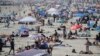 ازدحام مردم در ساحل «نیوپورت بیچ»، کالیفرنیا - ۲۴ مه ۲۰۲۰