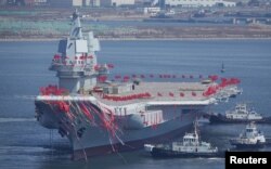 China's first domestically built aircraft carrier is seen during its launching ceremony in Dalian, Liaoning province, China, April 26, 2017.