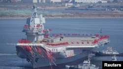 China's first domestically built aircraft carrier is seen during its launching ceremony in Dalian, Liaoning province, China, April 26, 2017.