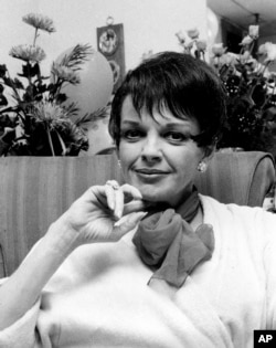 FILE - Judy Garland poses backstage at the Palace Theater in New York, July 31, 1967.