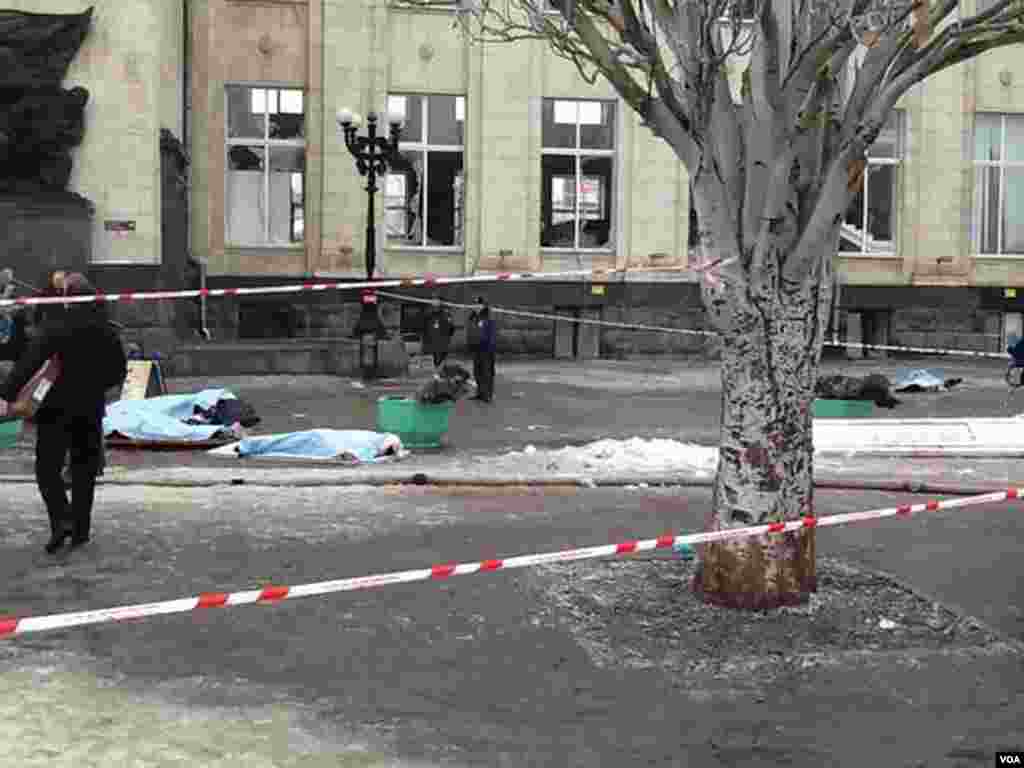 This image made available by the Volgograd Mayor&#39;s Office shows bodies at an entrance to the railway station after a suicide attack in Volgograd, Dec. 29, 2013.