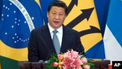Presiden China Xi Jinping memberikan pidato pada pembukaan forum kerjasama dengan Amerika Latin dan Karibia di Beijing, Kamis (8/1).
